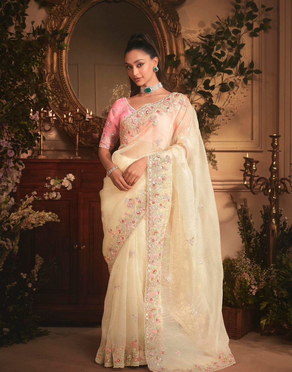 Graceful Cream Organza Saree with Rich Stone Work Border & All-Over Butta Embroidery Ideal for Weddings & Events - Buy