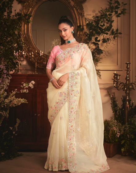Graceful Cream Organza Saree with Rich Stone Work Border & All-Over Butta Embroidery Ideal for Weddings & Events - Buy