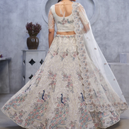 Graceful White Net Lehenga with Intricate Bel Butti Work Blouse & Dupatta Set - Buy_2