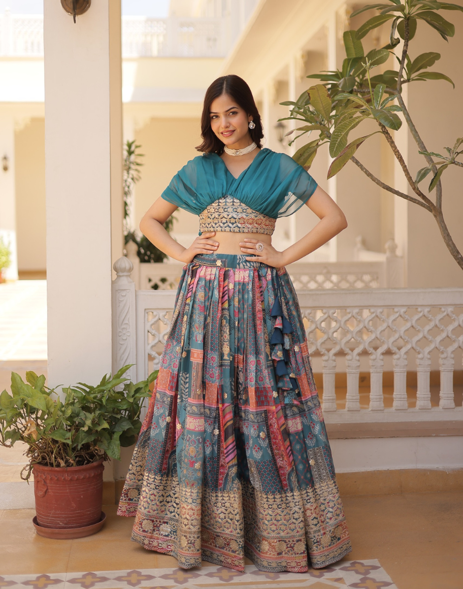 Woman in traditional outfit standing in a decorative indoor setting with plants.